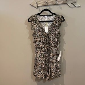 New with tags! BCBGeneration floral ruffle romper!
